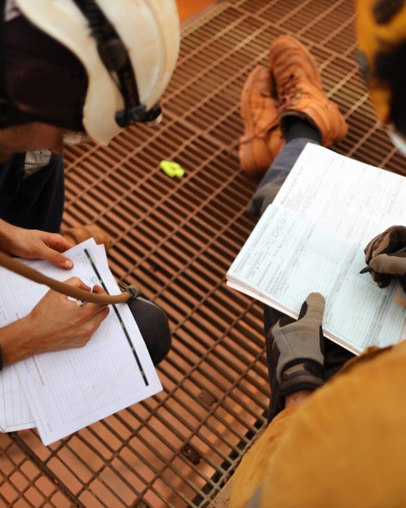 Work safe practise top view of construction worker are wearing w